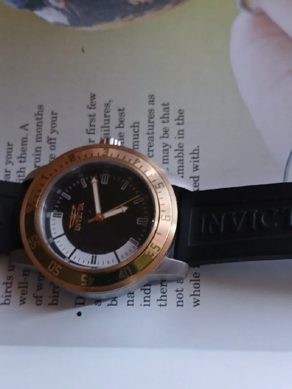 Invicta Black Strap Watch with Gold Bezel and Blue Dial